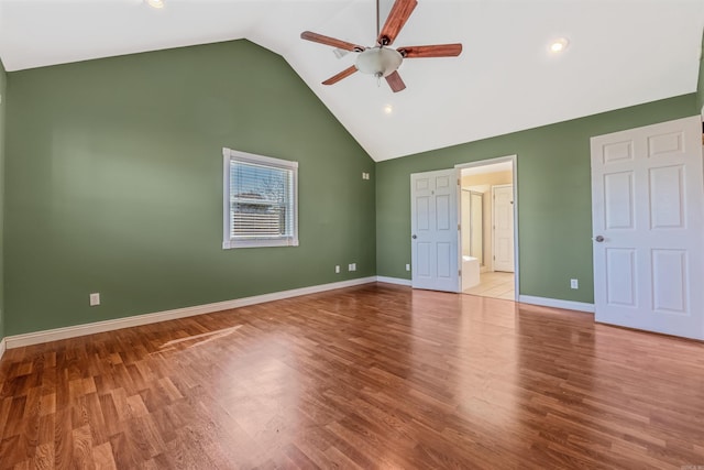 unfurnished bedroom with high vaulted ceiling, light wood-type flooring, and ceiling fan