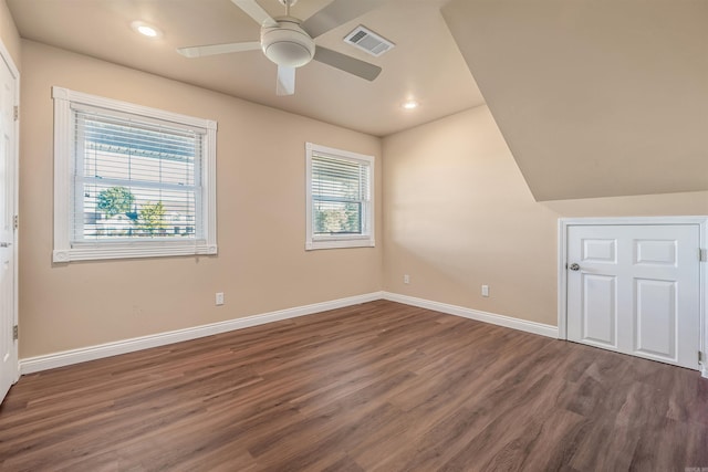 interior space featuring dark hardwood / wood-style floors, a healthy amount of sunlight, and ceiling fan