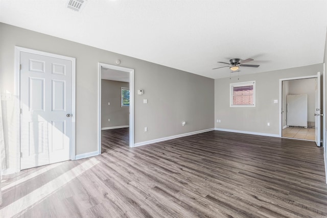 spare room featuring light hardwood / wood-style flooring, a textured ceiling, and ceiling fan