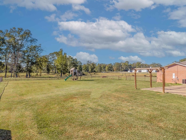 view of yard featuring a playground