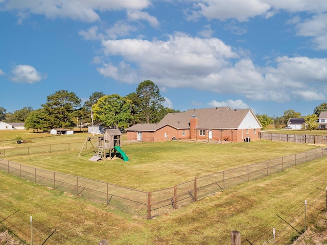 view of yard with a playground