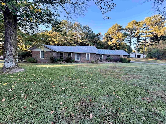 ranch-style house with a front yard