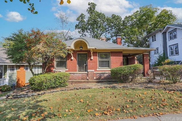 view of front of home featuring a front yard