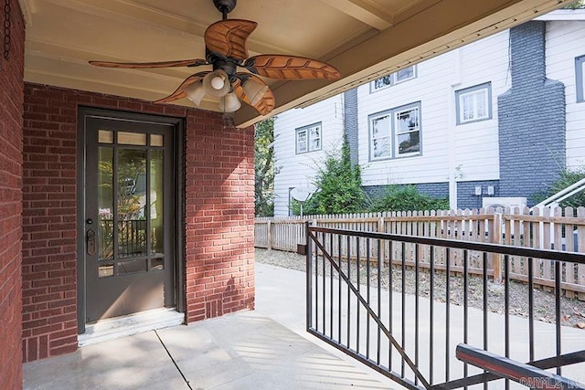 view of patio featuring ceiling fan