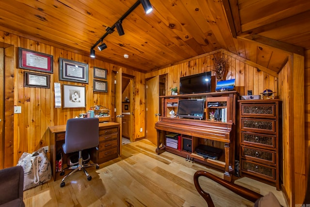 home office featuring wood ceiling, wood walls, light wood-type flooring, and rail lighting