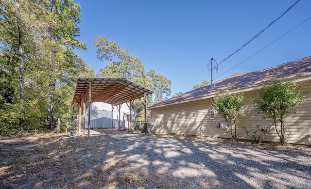 view of yard with a carport