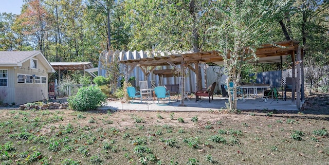 view of yard featuring a patio and a pergola