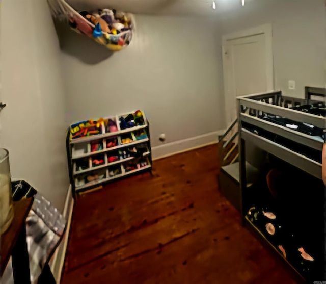 kitchen with dark wood-type flooring