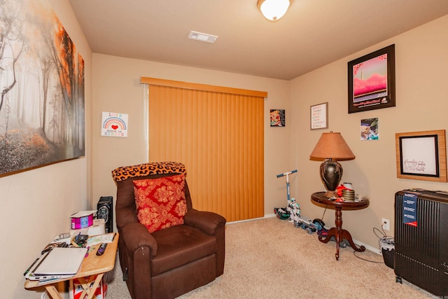 living area with carpet floors