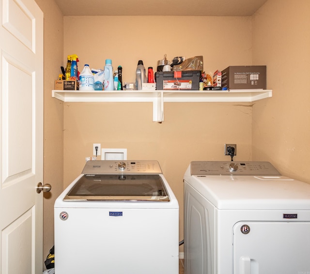 laundry area featuring washing machine and dryer