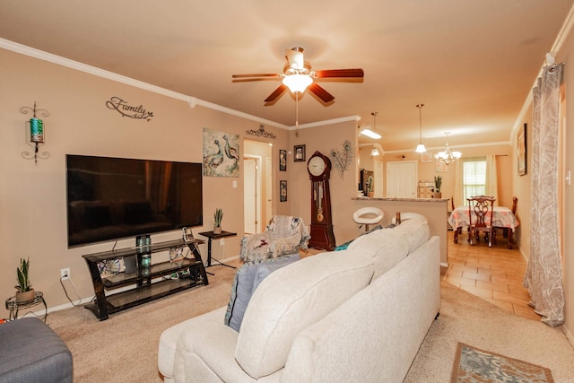 tiled living room featuring crown molding and ceiling fan with notable chandelier