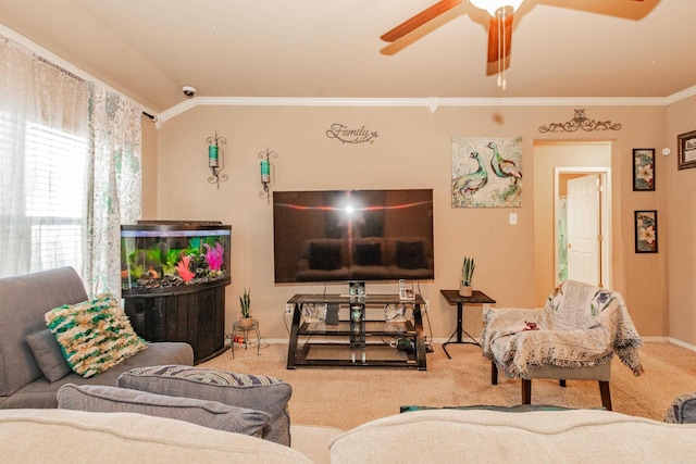 carpeted living room with crown molding, vaulted ceiling, and ceiling fan