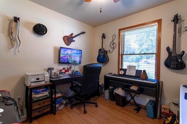 office area with hardwood / wood-style flooring and ceiling fan