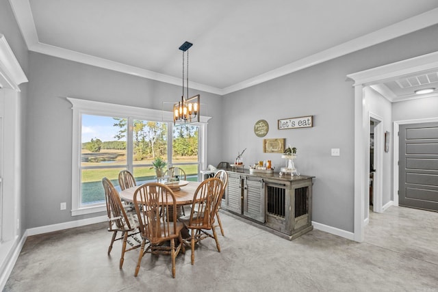 dining room featuring ornamental molding and a chandelier