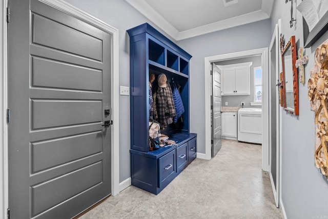 mudroom with ornamental molding, light carpet, and washer / clothes dryer