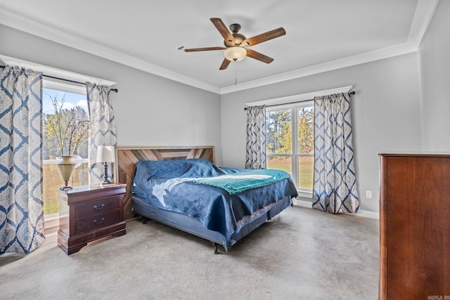 bedroom with ornamental molding and ceiling fan