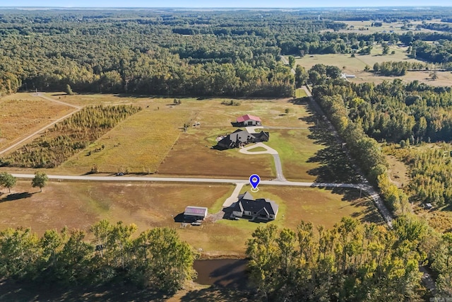 birds eye view of property featuring a rural view