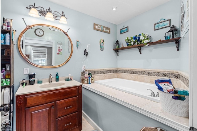 bathroom with vanity and a bathtub