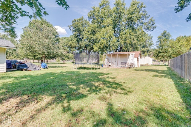 view of yard with a trampoline