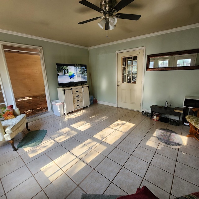 tiled living room featuring ceiling fan and ornamental molding