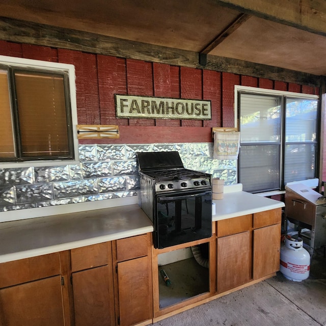 kitchen featuring black gas range oven