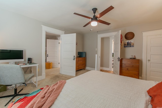 carpeted bedroom featuring ceiling fan