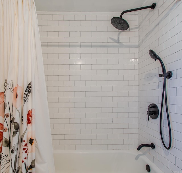 bathroom featuring shower / bathtub combination with curtain