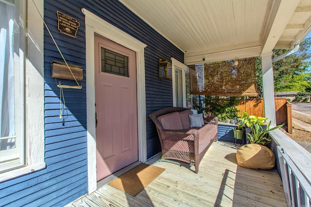 wooden terrace featuring a porch