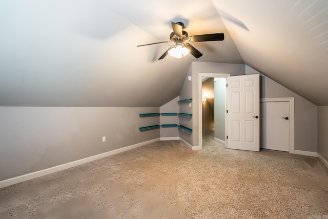 bonus room featuring light carpet, lofted ceiling, and ceiling fan