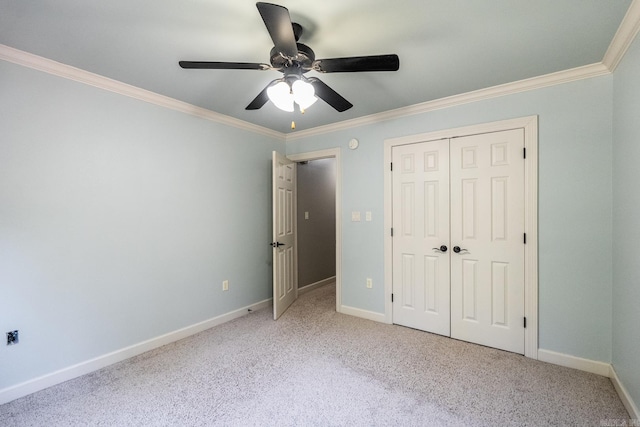 unfurnished bedroom featuring ceiling fan, ornamental molding, and light colored carpet