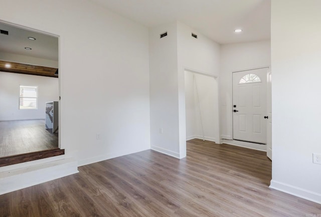 entrance foyer with light hardwood / wood-style flooring