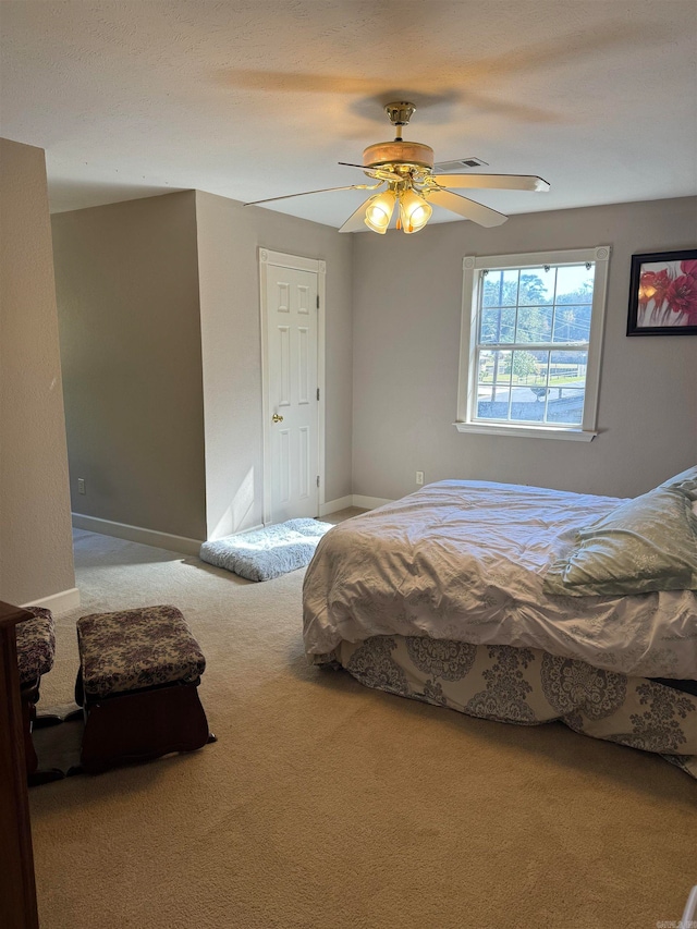 bedroom with carpet flooring and ceiling fan