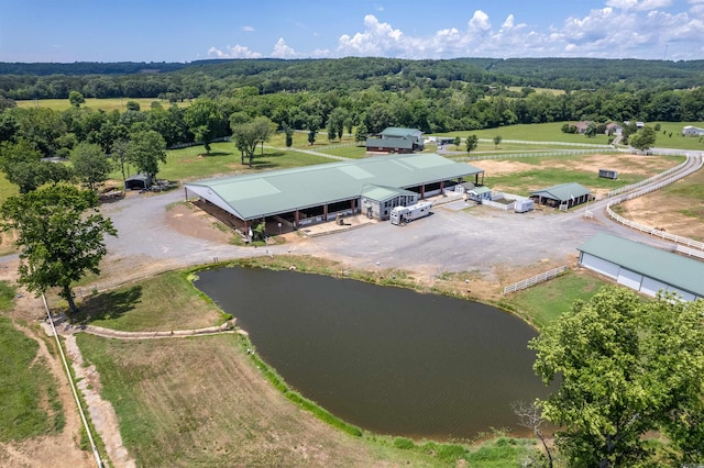 bird's eye view with a water view and a rural view