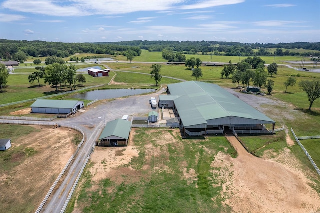 aerial view featuring a rural view and a water view