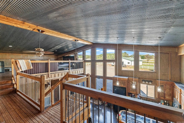 wooden deck featuring ceiling fan