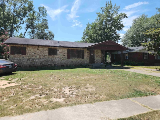 single story home with a front yard