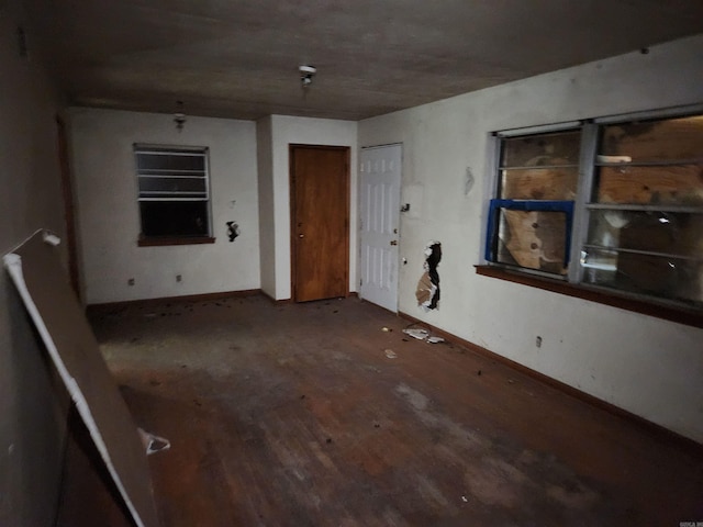 unfurnished room featuring hardwood / wood-style floors