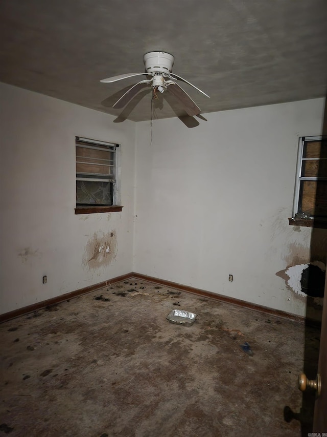 unfurnished room with ceiling fan