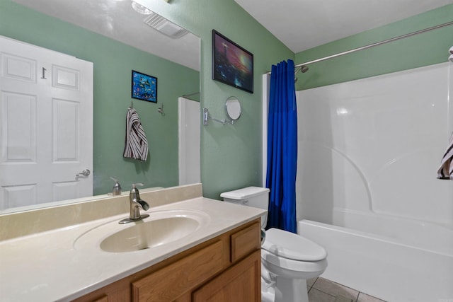 full bathroom featuring toilet, shower / bathtub combination with curtain, vanity, and tile patterned flooring