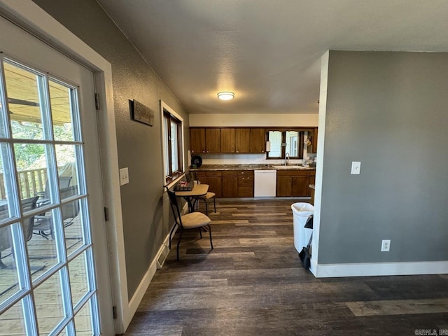 1211 S Edgewater Rd, Horseshoe Bend, AR 72512 - kitchen with white dishwasher and dark wood-style flooring