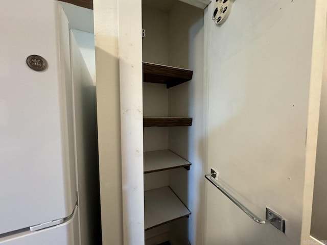 interior space featuring white refrigerator