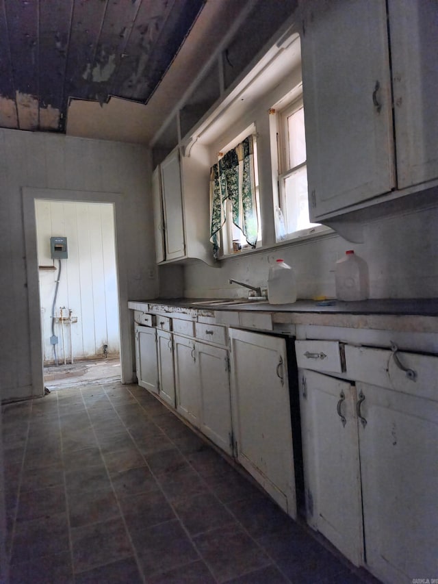 kitchen with sink and white cabinetry