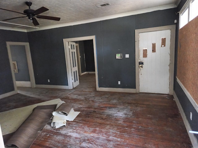 foyer entrance with ceiling fan, ornamental molding, and dark hardwood / wood-style flooring