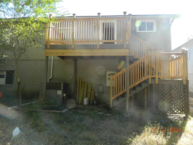 rear view of house with a deck