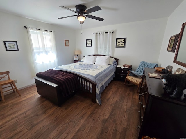 bedroom featuring dark wood-type flooring and ceiling fan