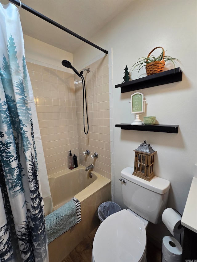 bathroom with shower / bath combo with shower curtain and toilet