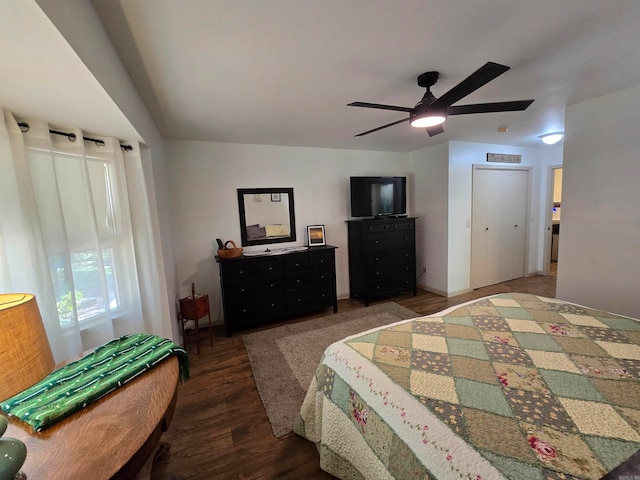 bedroom featuring ceiling fan and dark hardwood / wood-style flooring