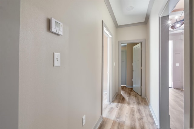 corridor with light wood-type flooring