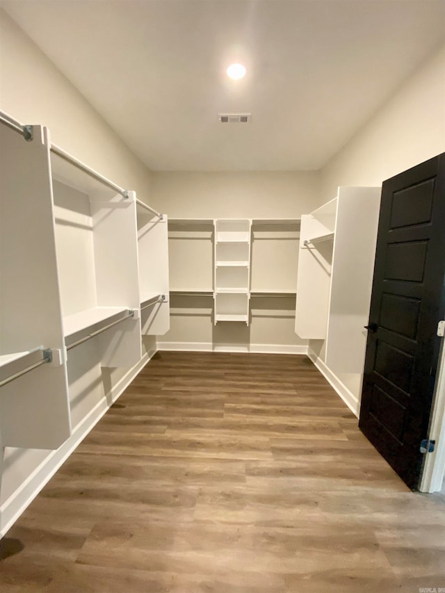 walk in closet featuring light wood-type flooring