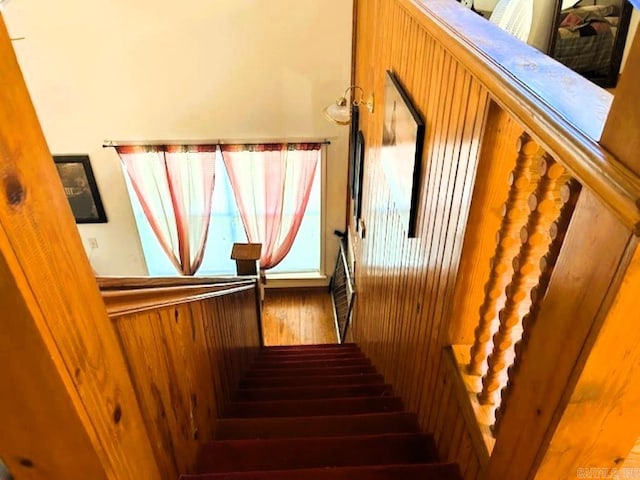 staircase featuring hardwood / wood-style flooring